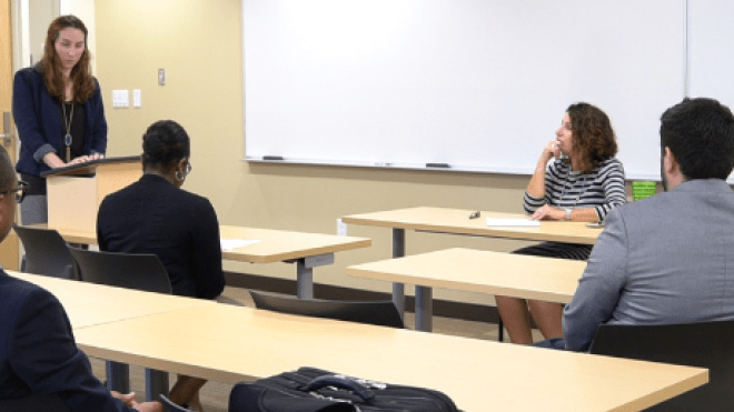 Students preparing for case in classroom.