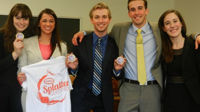 students pose for photo