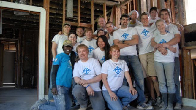Students inside a house built for Habitat for Humanity