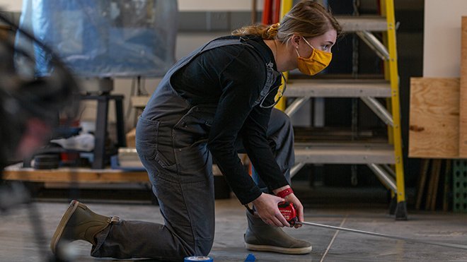 Audrey Corcoran using measuring tape 