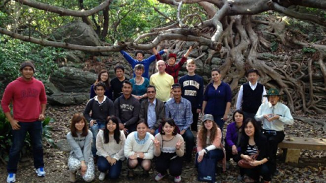 Students in front of a tree