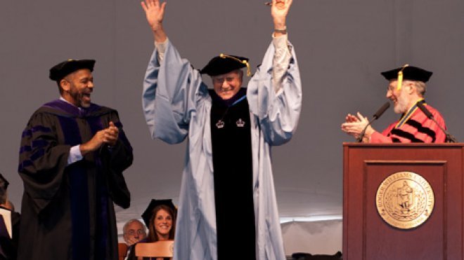 Graduate celebrates receiving a degree.
