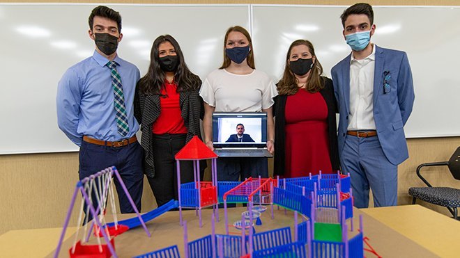 Engineering design team with model playground