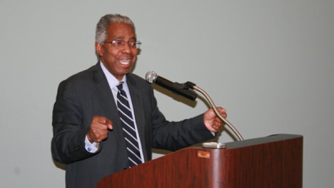 Lecturer speaks to audience