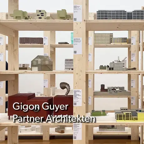 Models housed on wooden shelves