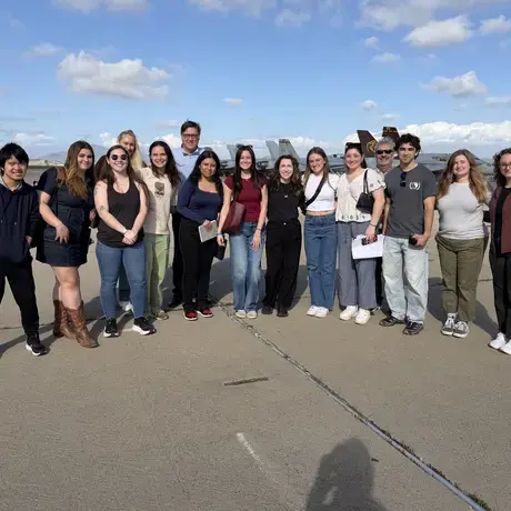 Students pose for a photo on their visit to San Diego airport site