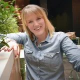 A headshot of Blair Carroll