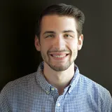 A headshot of Nick Corey