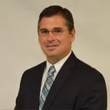 A headshot of Sean Varano