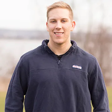 A headshot of Jason Hall