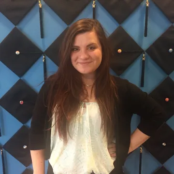 A headshot of Maggie Daubenspeck