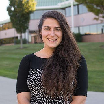 A headshot of Sarah DelSanto standing on campus