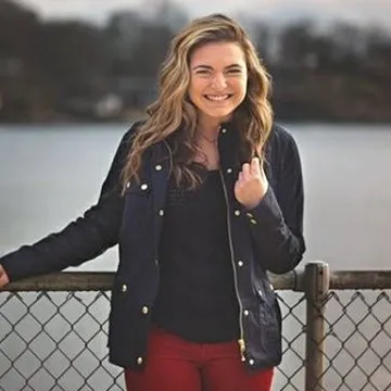 Kristina Rauccio stands in front of water
