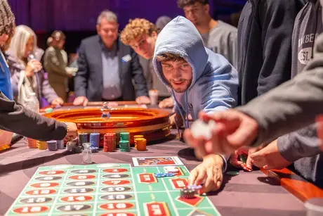 Students playing at Casino Night.