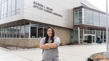 Alyssa Foerster outside the SECCM Labs building