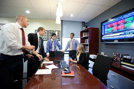 Students working in the trading room.