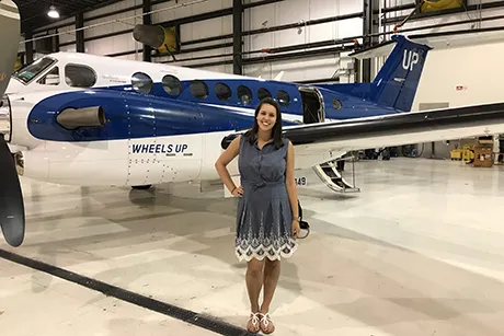Francesca Montemarano in front of an airplane