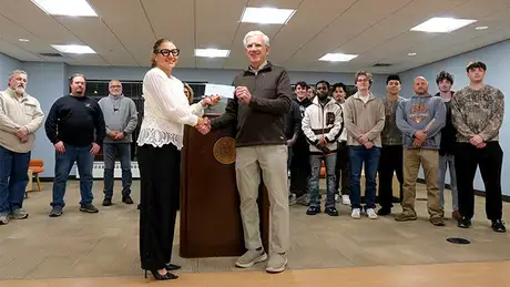 Don P. and Elaine M. Hayden scholarship check presentation.