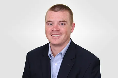 A headshot of Joseph McKenna.