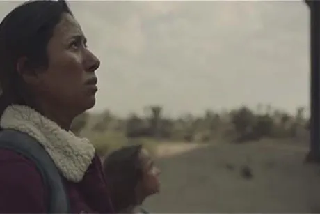 A still image from a commercial of a woman and her daughter.