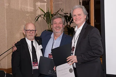 Dean Stephen White and Associate Dean Gregory Laramie accept the award.
