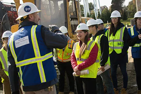 Students learn the construction process from the SECCM Labs project.