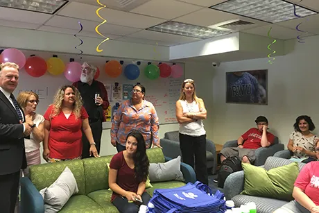 Students sitting in new commuter lounge at RWU