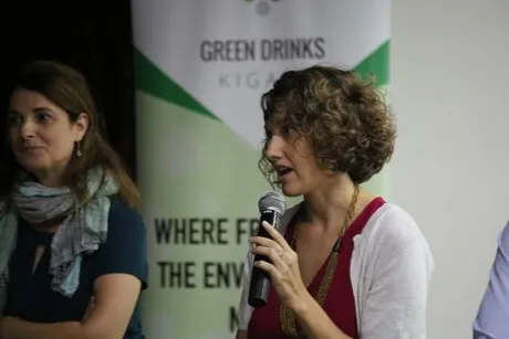 Person speaking into microphone.