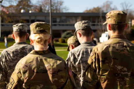 RWU ROTC cadets stand at attention during the ceremony.