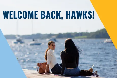 Students sitting on dock. Text reads Welcome Back Hawks.