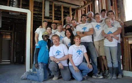 Students inside a house built for Habitat for Humanity