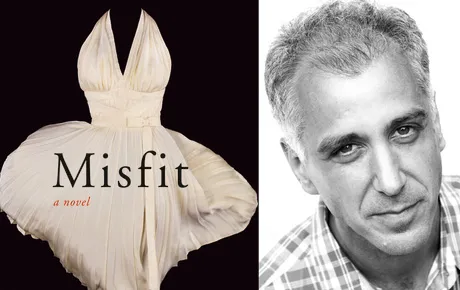 Author with cover of his book