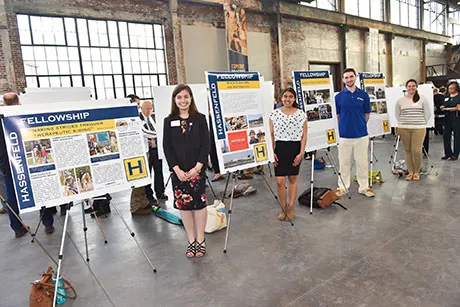 Students presenting posters about their community-engaged work.