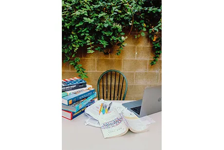 desk with books on it