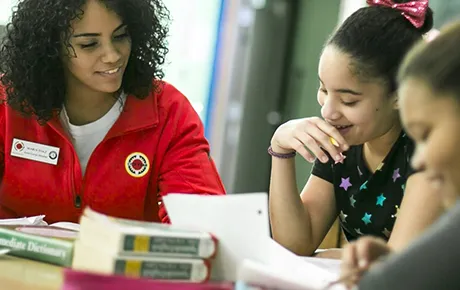 Volunteer mentors children.