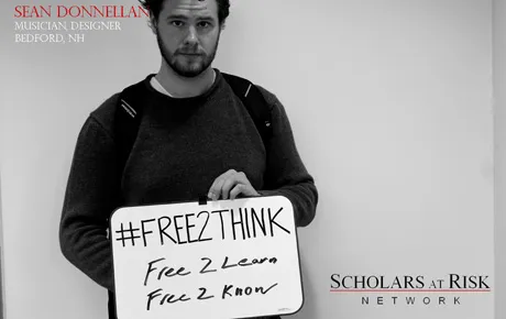 Student holds up his free speech statement