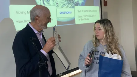 Myah Melucci awards Dr. Klaper with a Planetary Health and Harmony Award