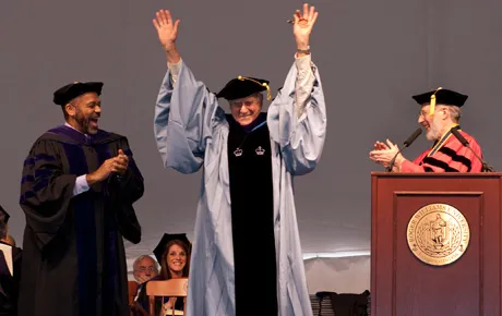 Graduate celebrates receiving a degree.