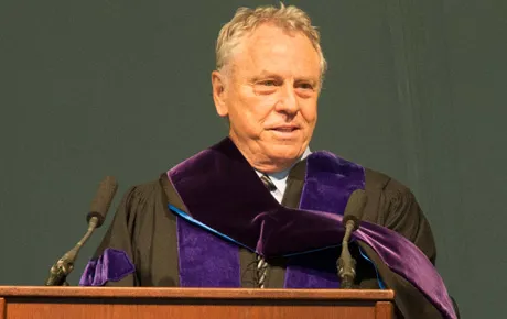 Man speaks at lectern