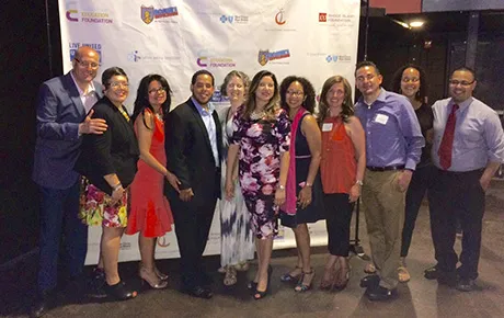 A group gathers to celebrate a milestone.