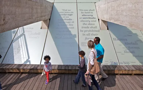 People explore a memorial