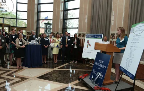 Woman speaks at a reception