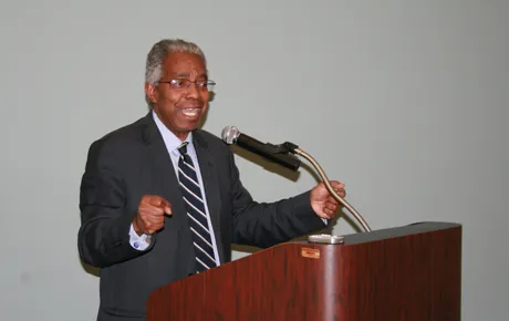 Lecturer speaks to audience