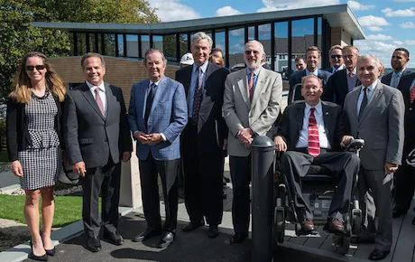 Ribbon cutting at center