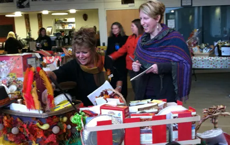 Visitors look at turkey baskets