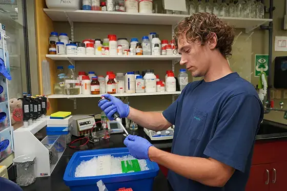 Student researches in the Aquatic Diagnostic Lab