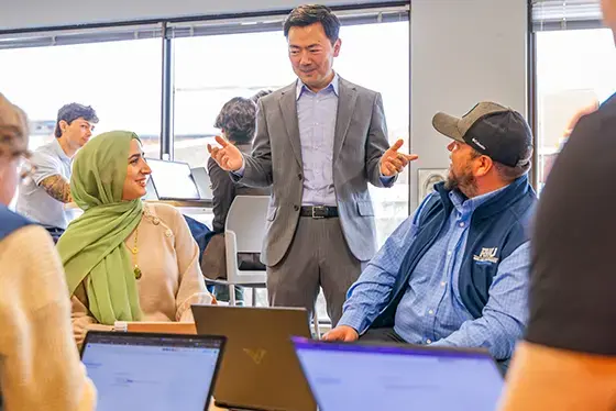 Professor talking with students