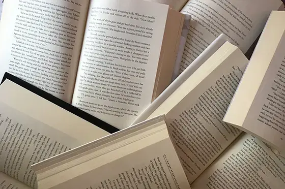 pile of open books
