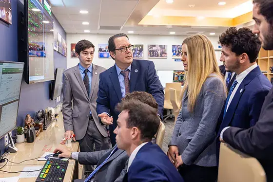 Students work with professor in the CAFE