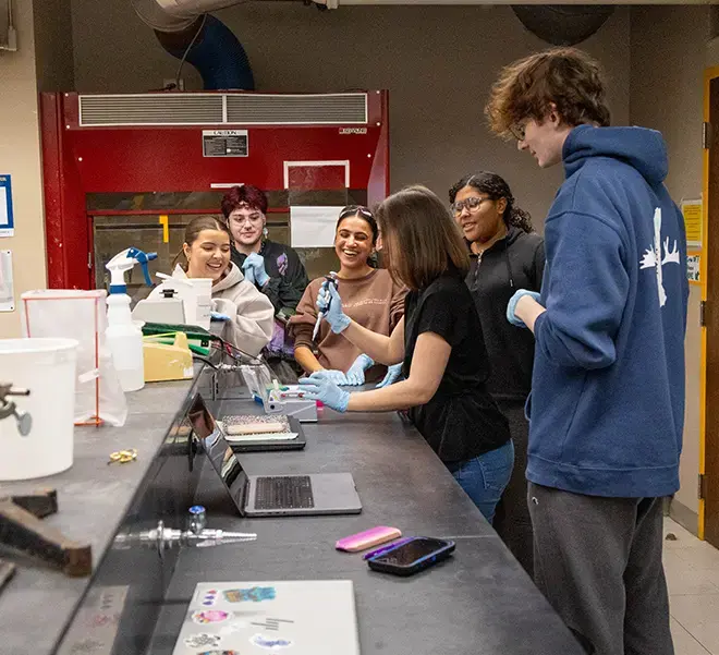 Students collaborate in biology lab